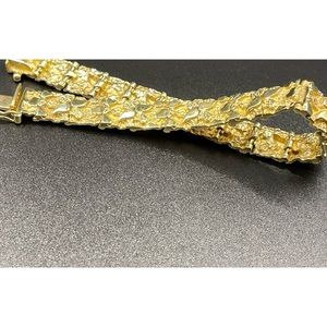 Gold tennis bracelet